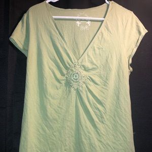 Green maternity shirt with bead embellishment